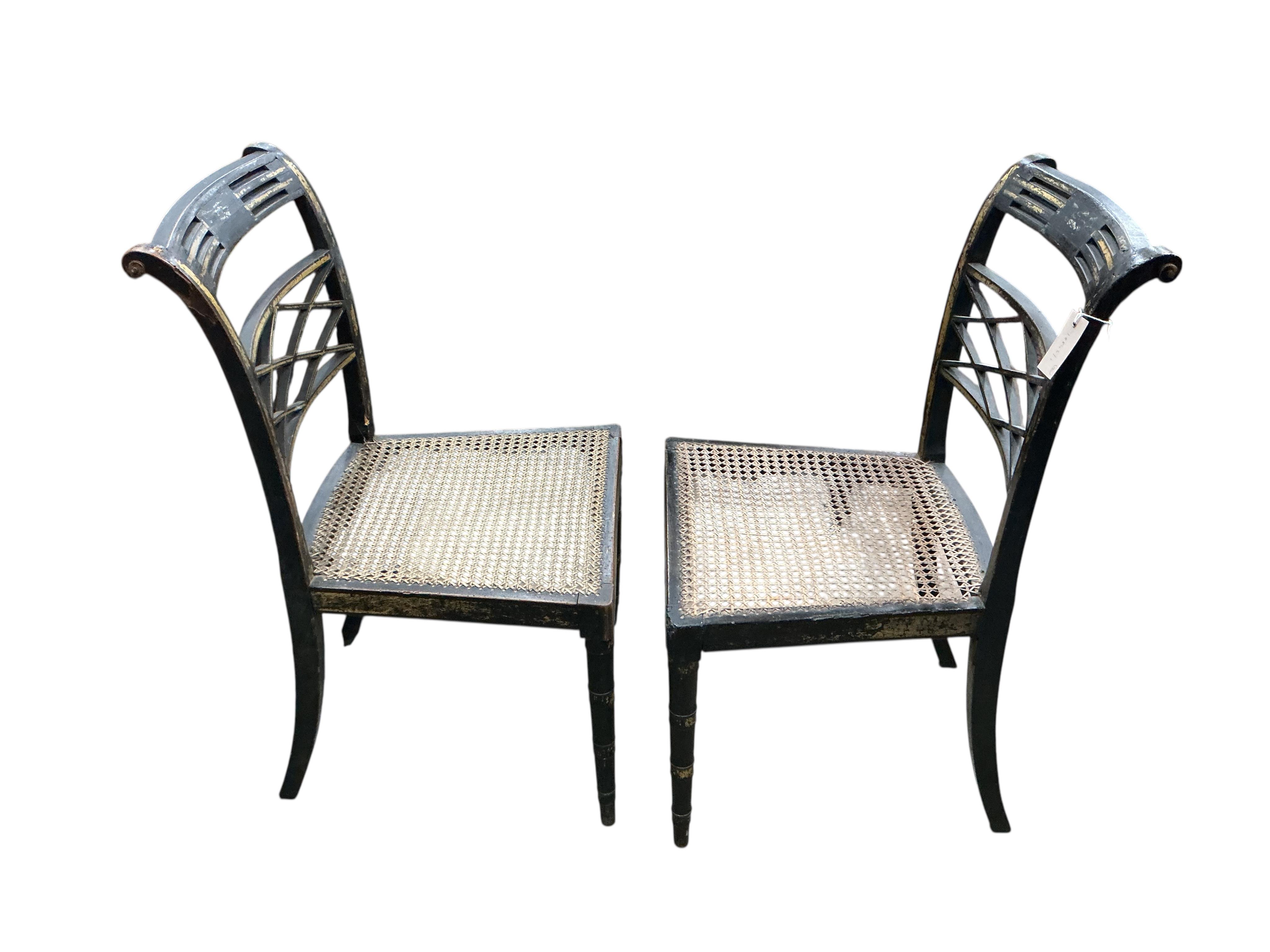 A set of four Regency ebonised cane seat dining chairs, width 46cm, depth 42cm, height 86cm
